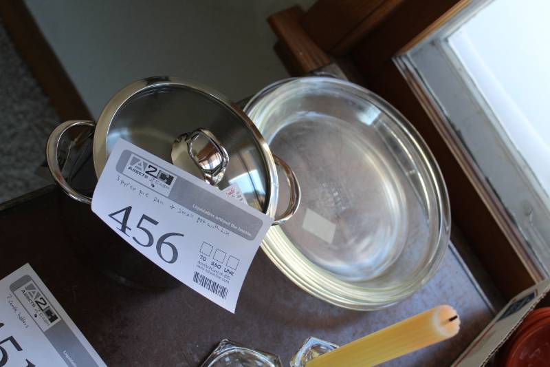 lot 456 image: Pyrex Glass Pie Pans, Stainless Steel Pot with Lid
