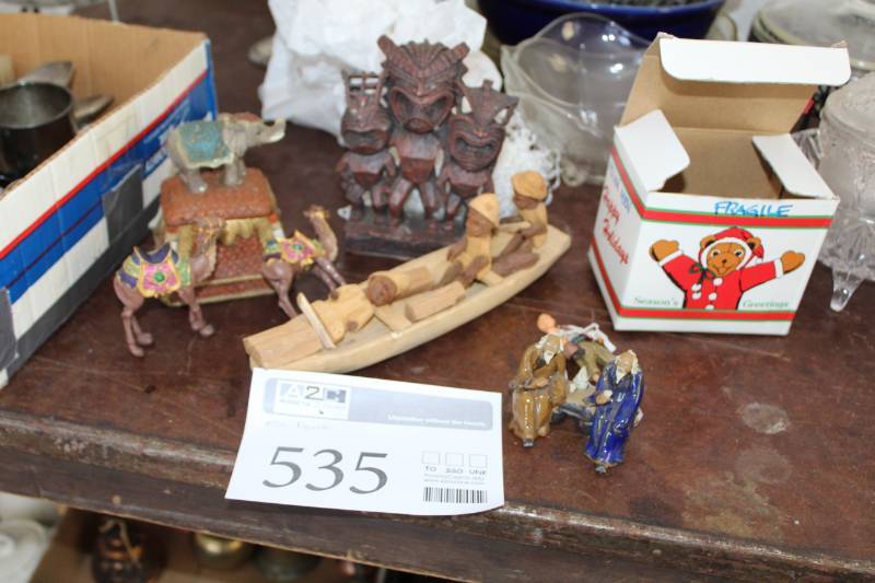 lot 535 image: Ceramic Table Dcor - Camels, Herders, Tiki, Elephant, And More