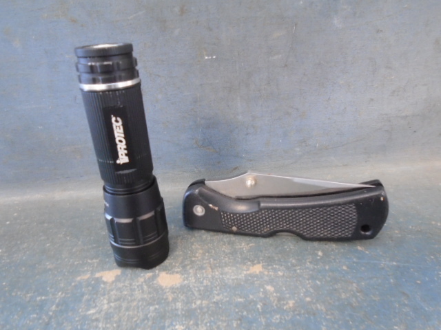 lot 11 image: Flashlight and Knife