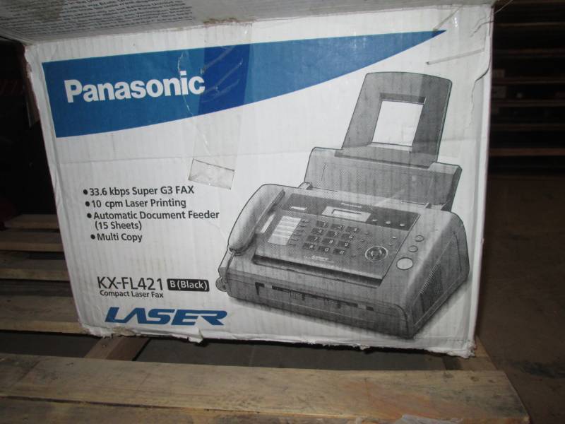 lot 310 image: Panasonic fax machine...