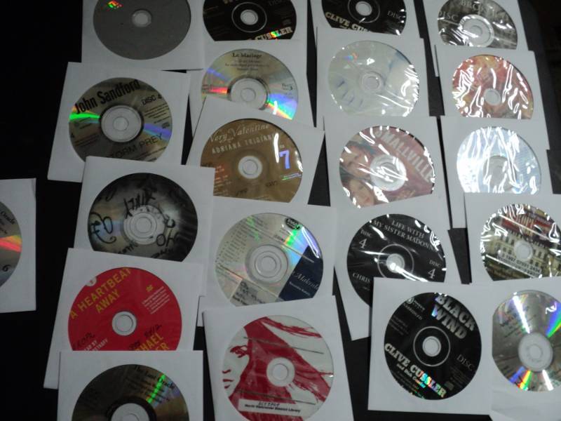 lot 145 image: 100 CDs and DVDs and Games...