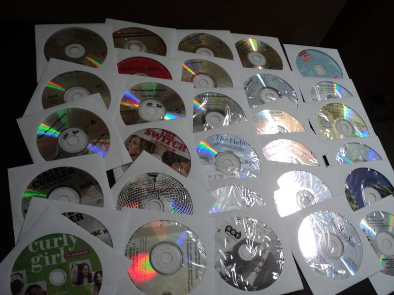 lot 148 image: 100 CDs and DVDs and Games...