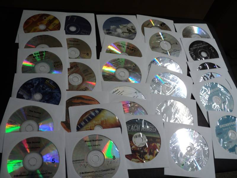 lot 149 image: 100 CDs and DVDs and Games...
