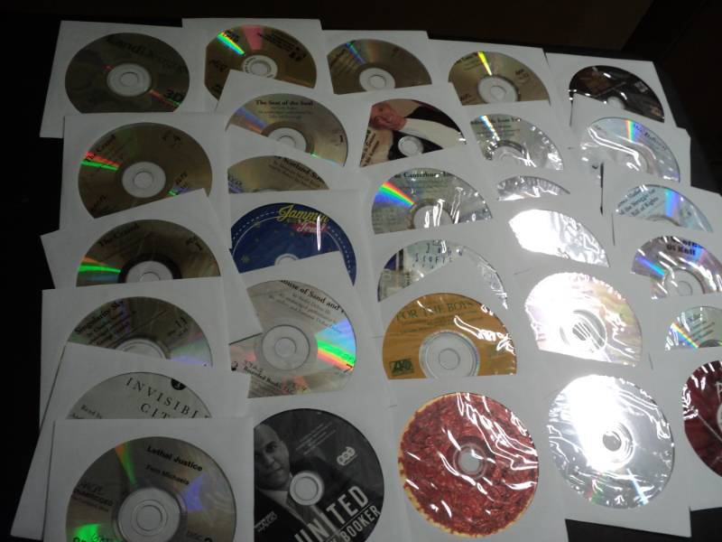 lot 151 image: 100 CDs and DVDs and Games...