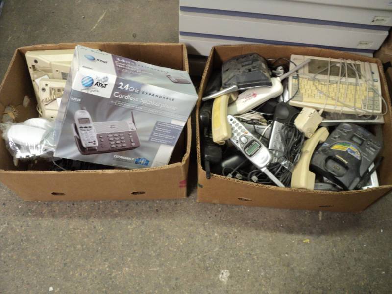 lot 154 image: 2 boxes of Phones and Accessories...