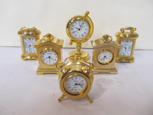 lot 41 image: Group of Miniature Brass Clocks