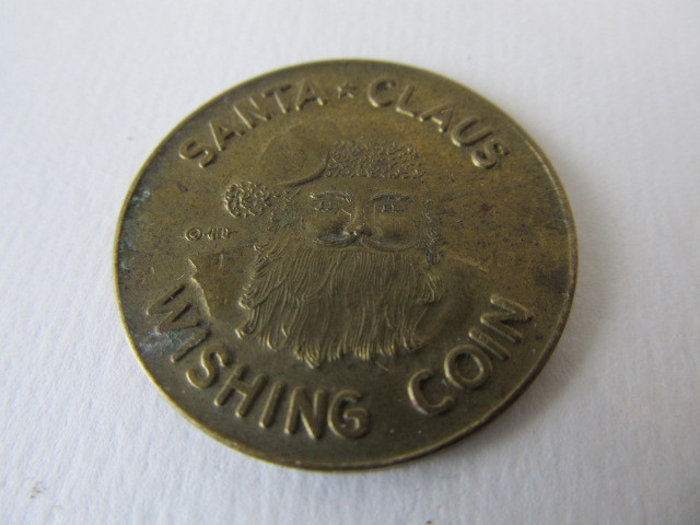 lot 68 image: Orig 1933 Dayton Company SANTAS TOY SHOP Wishing coin