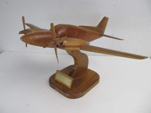 lot 133 image: Large Vintage Solid Wood Twin-Engine Airplane
