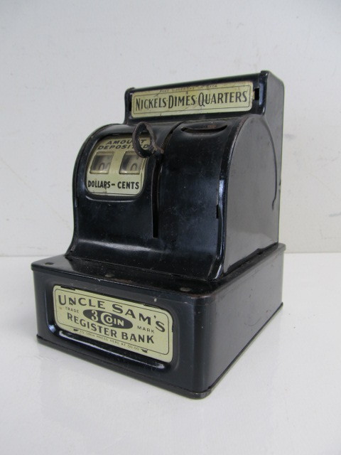lot 134 image: Vintage Metal UNCLE SAMS Toy Bank