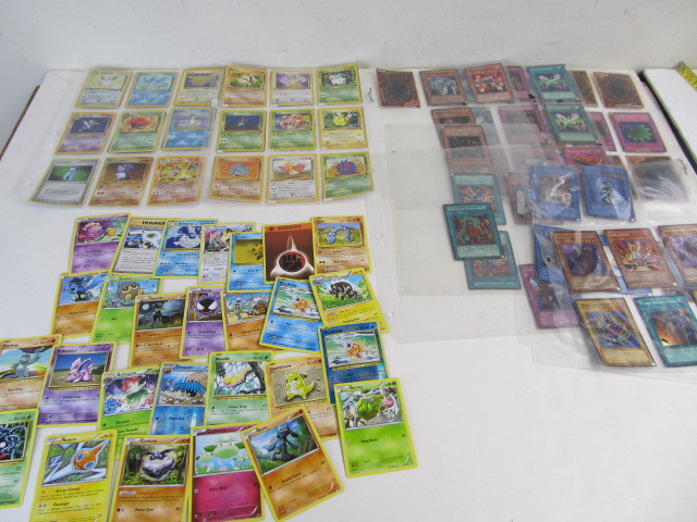 lot 149 image: Group of POKEMON & Yu-Gi-Oh Cards