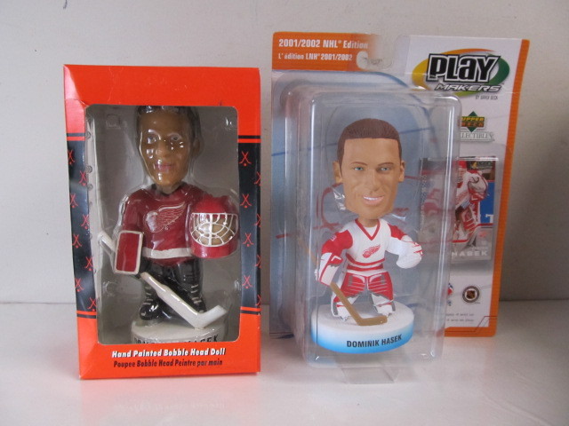 lot 160 image: 2 Dominek Hasek Bobbleheads