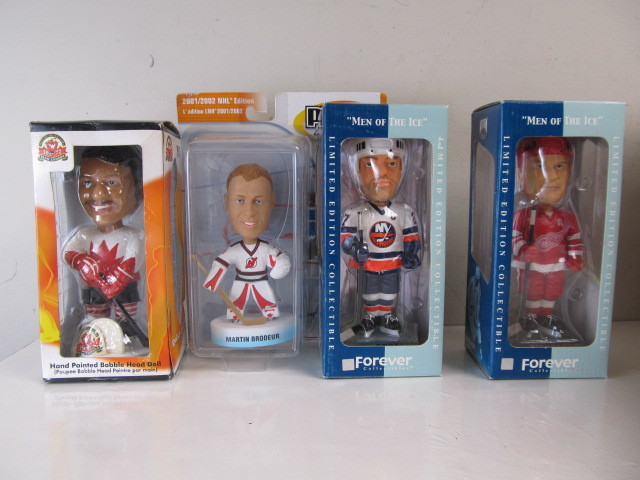 lot 161 image: Group of 4 Hockey Bobbleheads