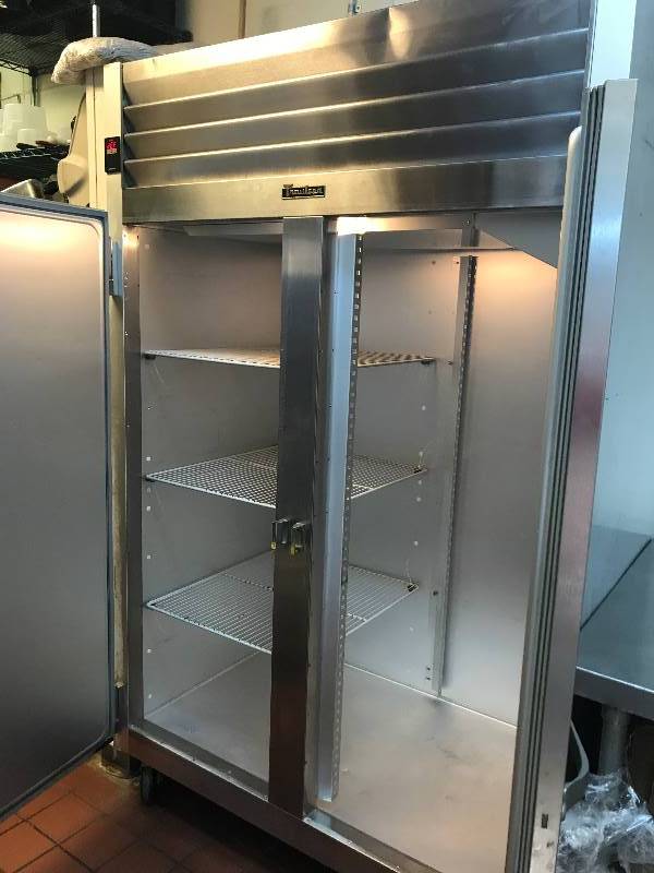 lot 7 image: Traulsen 2 Door Refrigerator on Wheels, Model G20010, 52 Wide, 115VRuns Cools