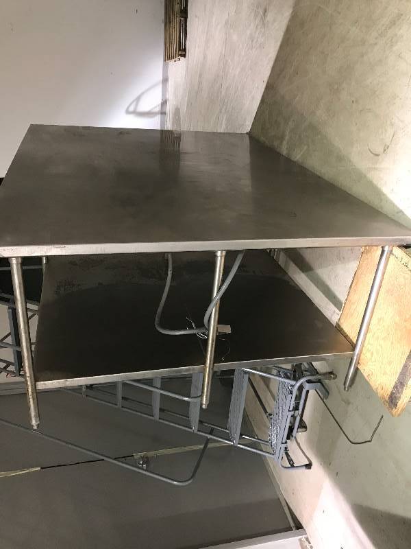 lot 64 image: Stainless steelCHEFS TABLEstainless steel under shelf, 8x6x36H.
