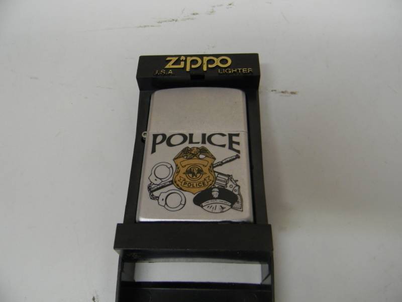 lot 20 image: NOS NEVER USED ZIPPO LIGHTER - POLICE - SEE PICTURES