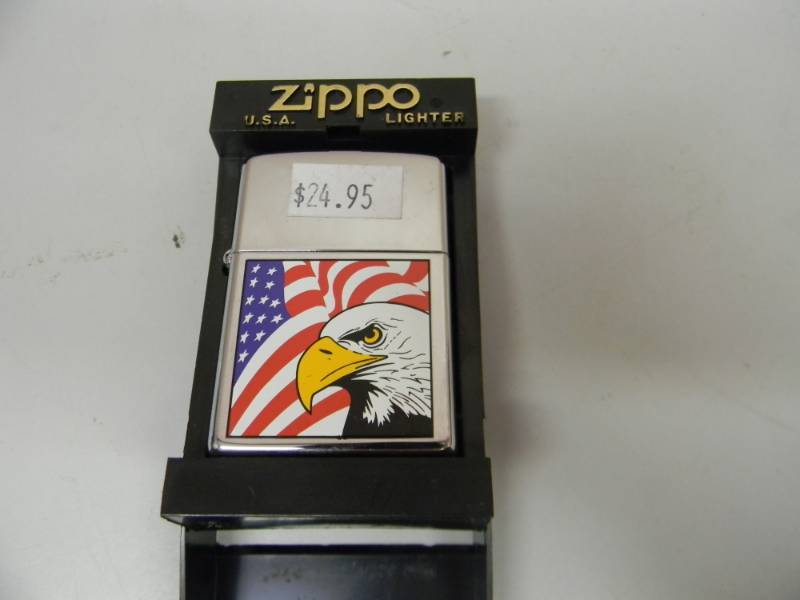 lot 25 image: NOS NEVER USED ZIPPO LIGHTER - FLAG EAGLE - SEE PICTURES