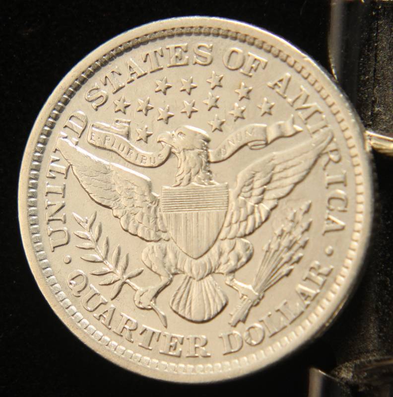 lot 06 image: 1893 BARBER SILVER QUARTER IN HIGH GRADE