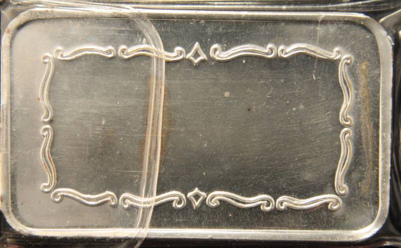 lot 62 image: 5 TROY OZ. .999 FINE SILVER BAR COVERED WAGON DESIGN