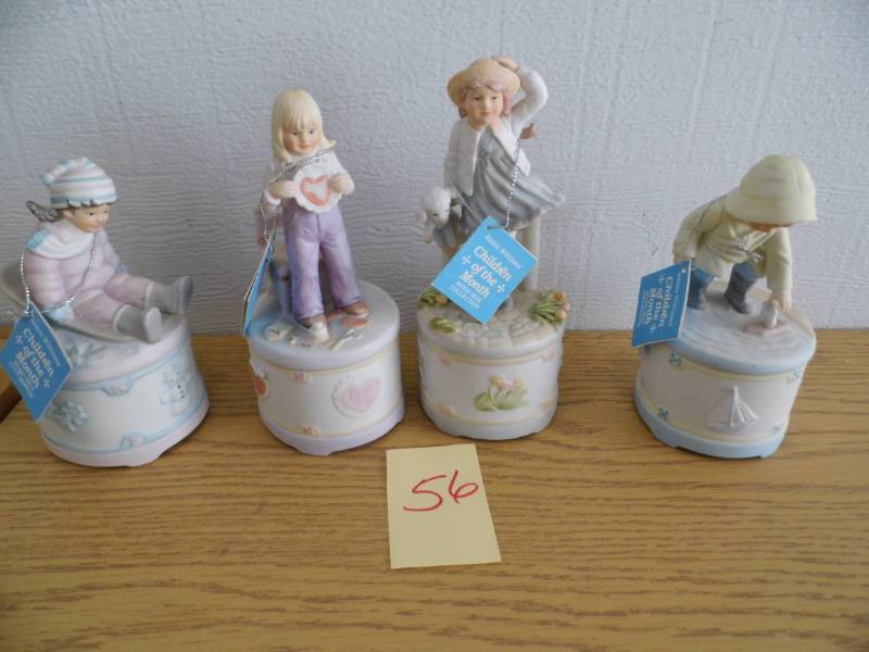 lot 56 image: Children of the Month Musical Figures
