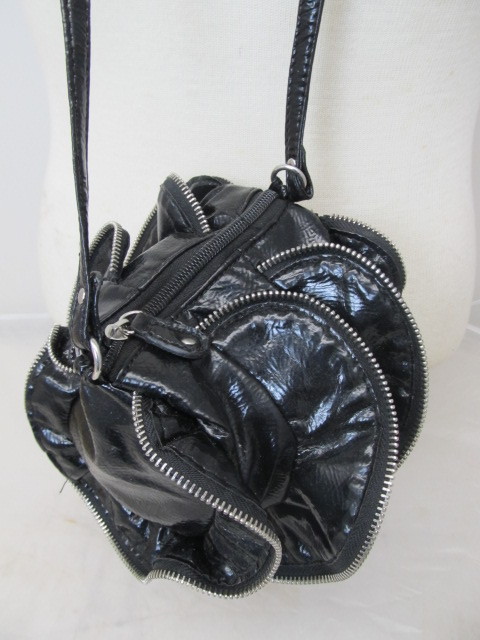 lot 33 image: STEVE MADDON Small Designer Zipper Handbag w Leopard Print Interior