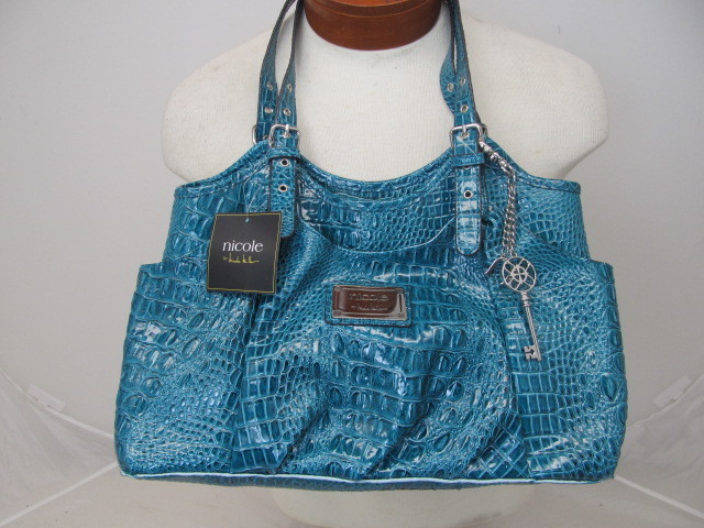 lot 18 image: Brand New Womens Designer Teal Alligator Design Handbag by Nicole Miller