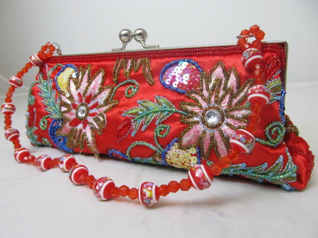 lot 15 image: Beautiful Red Beaded Design Clutch w Beaded Strap