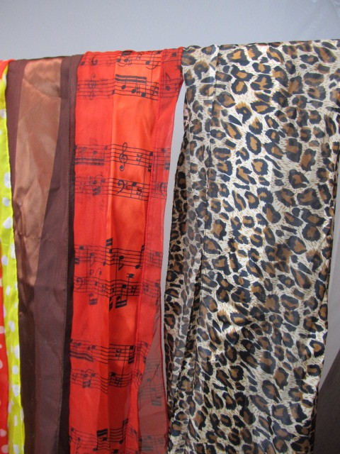 lot 114 image: Large Lot of Womens Silky Smooth Fun Designed Scarves