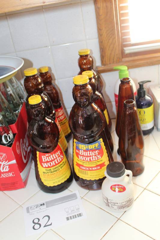 lot 82 image: Mrs. Butterworths Syrup Glass Bottles, Beer Bottles