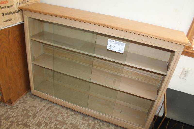lot 57 image: Wood 3-Shelf Rolling Display Cabinet with 2-Sliding Glass Doors