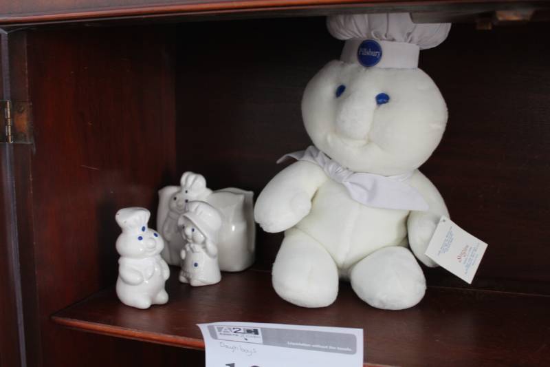 lot 107 image: Pillsbury Dough-boys Ceramic Salt & Pepper Shakers, Stuff Animal, Ceramic Napkin Holder
