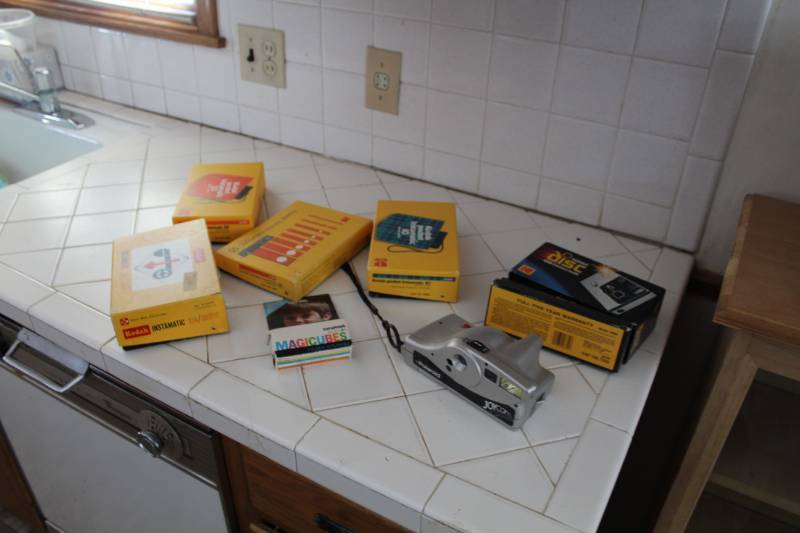 lot 125 image: Polaroid Joycam Camera, Kodak Disc 4000 Camera, Kodak Pocket Instamatic 20 Camera with Flash Cubes, Kodak Instamatic 18 Camera, Kodak Instamatic 104 Camera