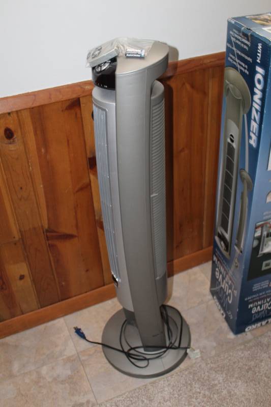 lot 203 image: Lasko 42in. Wind Curve Platinum Oscillating Space-Saver Fan with Fresh Air Ionizer