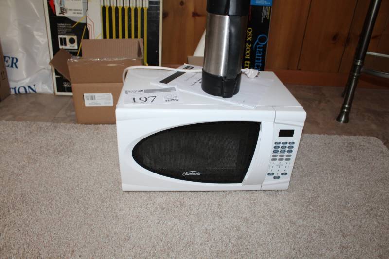 lot 197 image: Sunbeam 0.7 cu.ft. Countertop Microwave with Manual