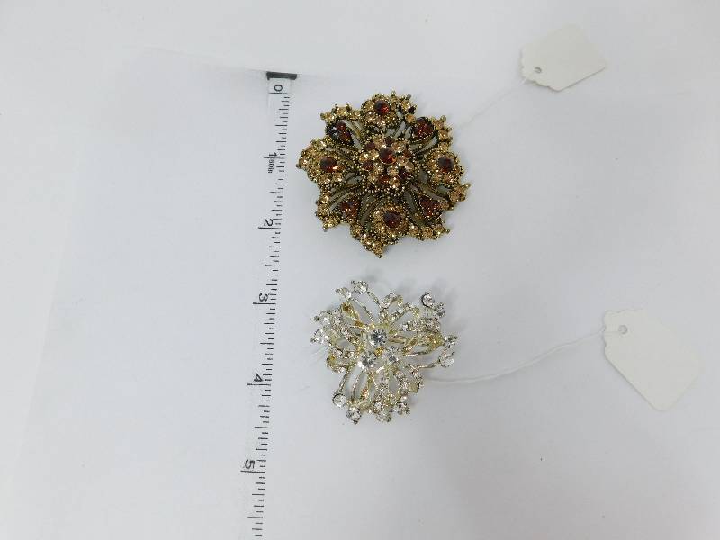 lot 36 image: Two Brooches For Special Occasions