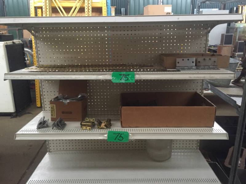 lot 75 image: Two shelves of large hinges, door handles & overhead door hinges