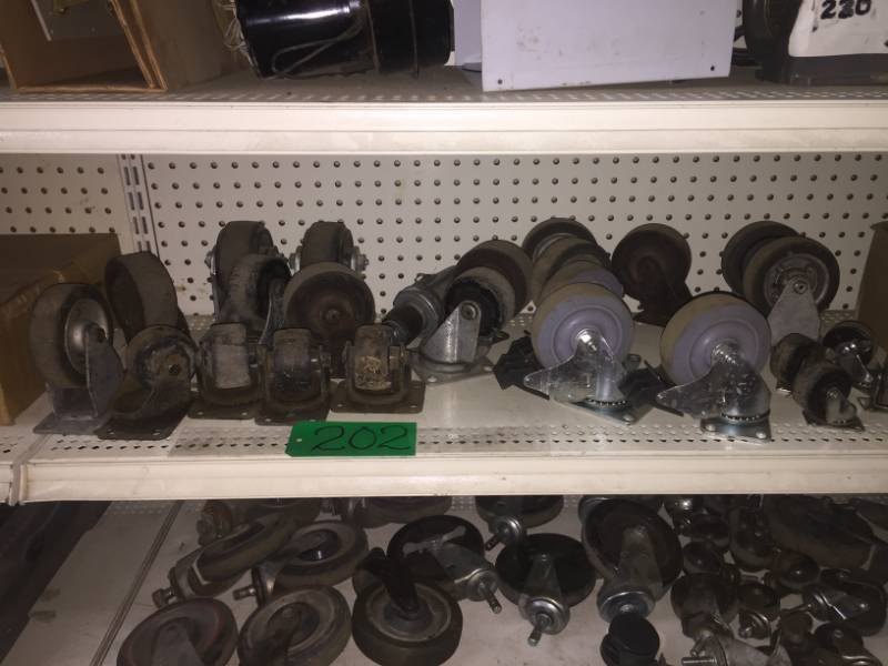lot 202 image: Shelf of Caster Wheels