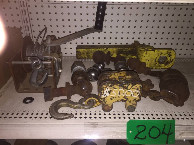 lot 204 image: Misc hardware items, winch, trailer hitch, 7 trailer balls and more