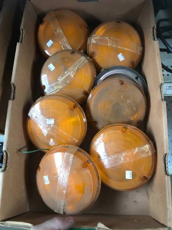 lot 166 image: Seven lights with yellow lenses