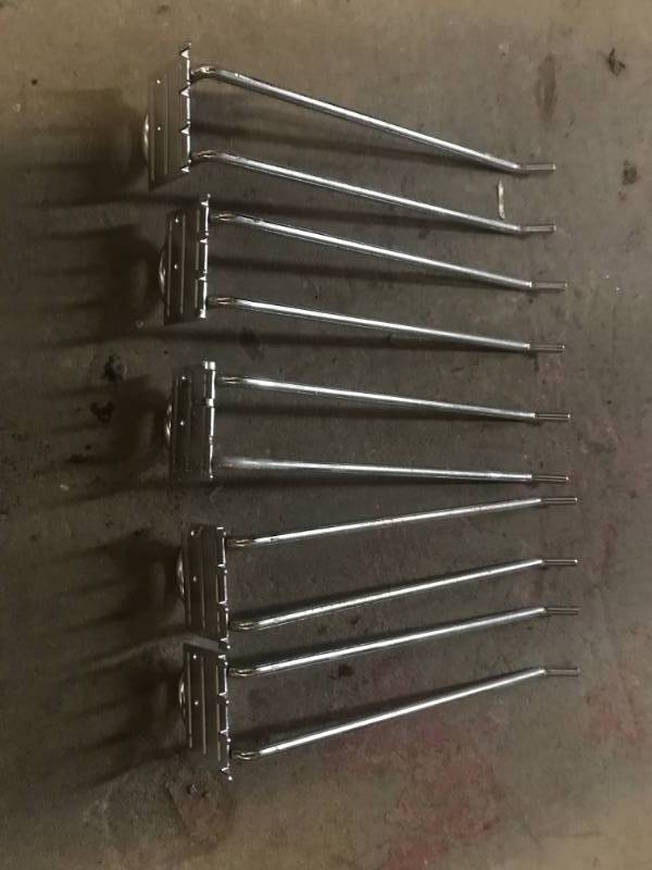 lot 214 image: Box of small wheels Stem & Caster 18 & HD Peghooks 18 for rakes, shovels, hammers