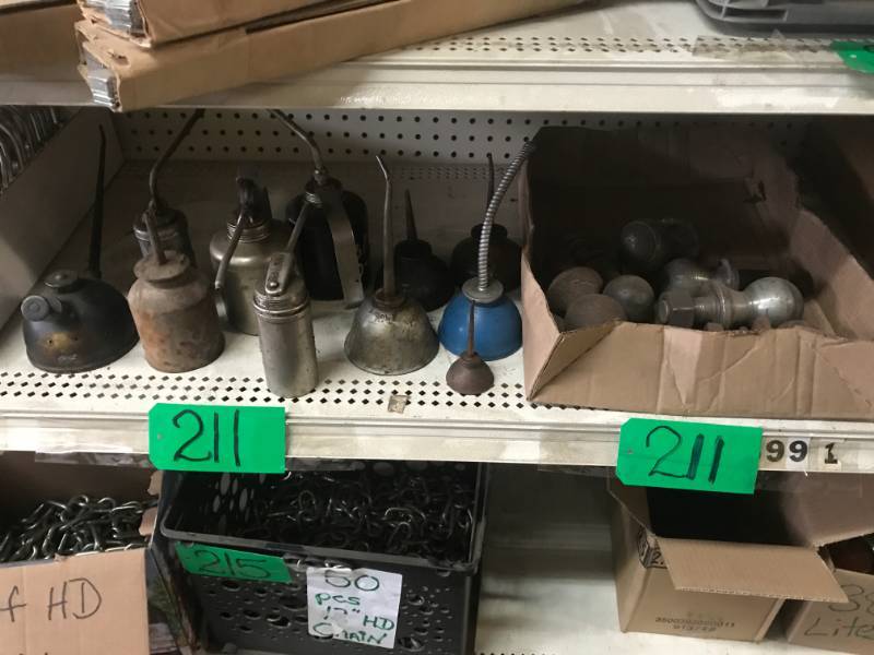 lot 211 image: Various Oil Cans (11) wtrailer balls (7)