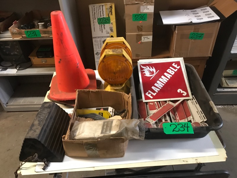 lot 234 image: Tub of Reflectors, safety tags & signs, chock, 2 safety signs Interplex Solar