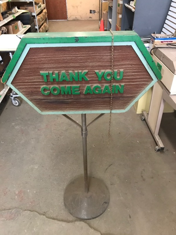 lot 256 image: Double sided wood & metal sign on base