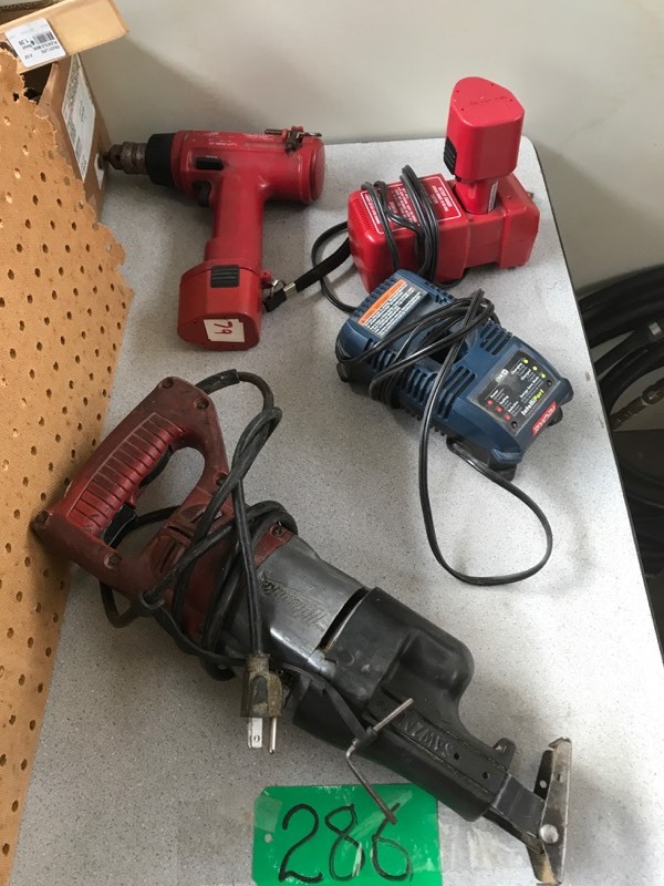 lot 286 image: One Milwaukee Sawsall, One Milwaukee Drill 9.6V wcharger & 2 batteries