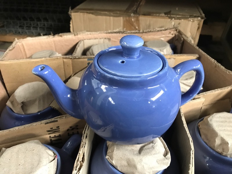 lot 326 image: Two Large Boxes New Blue Teapots