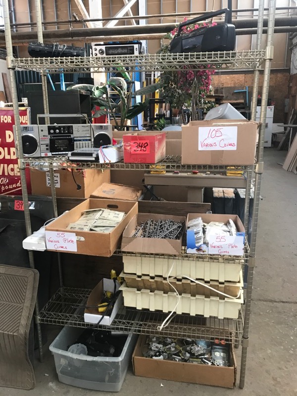 lot 348 image: Shelf of Misc Lights, Electrical Cover Plates, Tape Players, Radios, Waterfall Peghooks