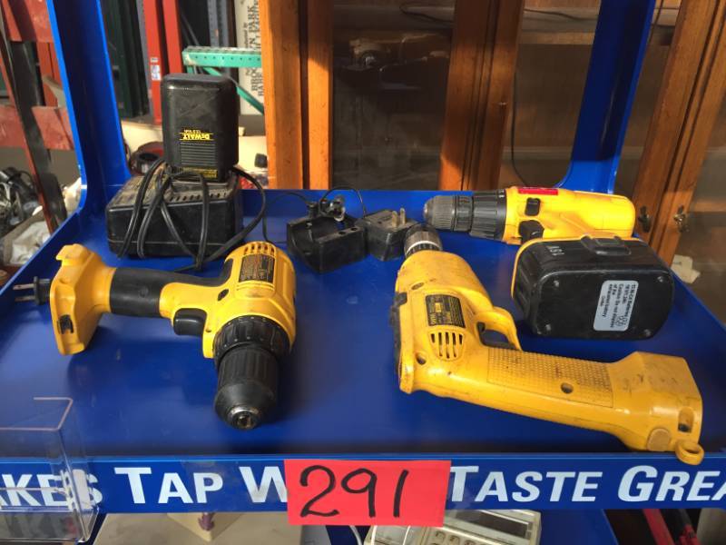 lot 291 image: One Shelf of DeWalt Power Tools, 3 Drills, Two Batteries work, 2 12V & 1 18V wcharger 12V
