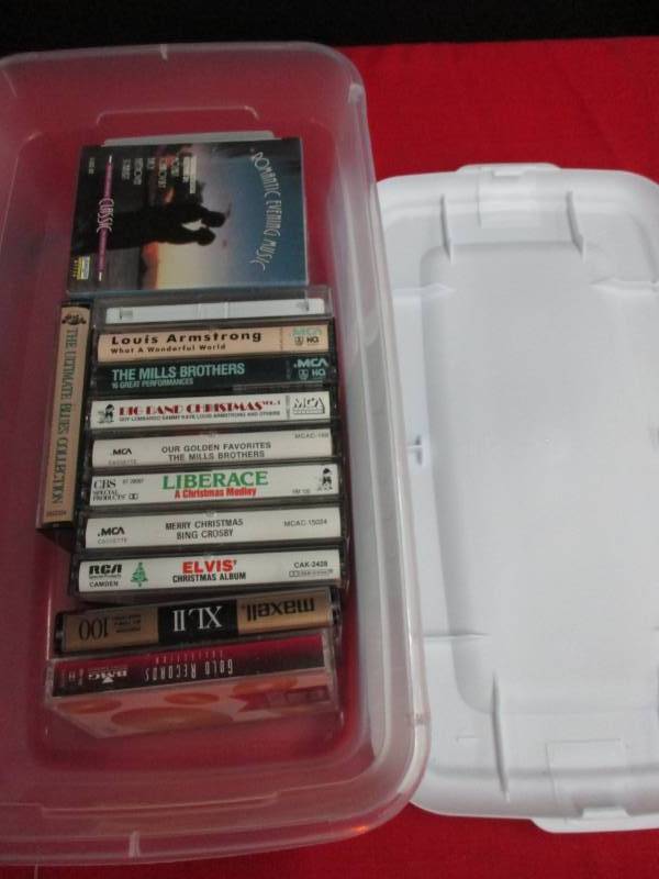 lot 29 image: Romantic cassettes, elvis Christmas and more in a tub