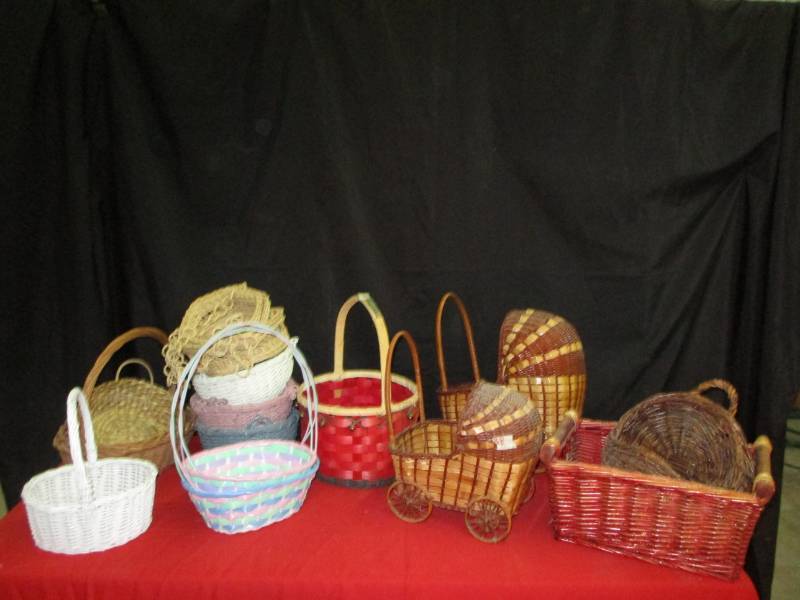 lot 38 image: Pile of baskets, hanging baskets, Strollers