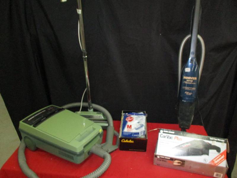 lot 41 image: Hoover Vacuum and vacuum bags along with a car vac and Hoover Quadraflex