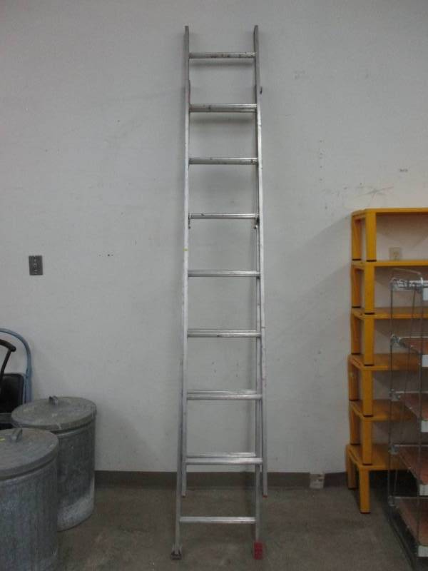 lot 49 image: Werner Aluminum Extendable total length 16 ft and extends to 30 feet Ladder 200 pounds